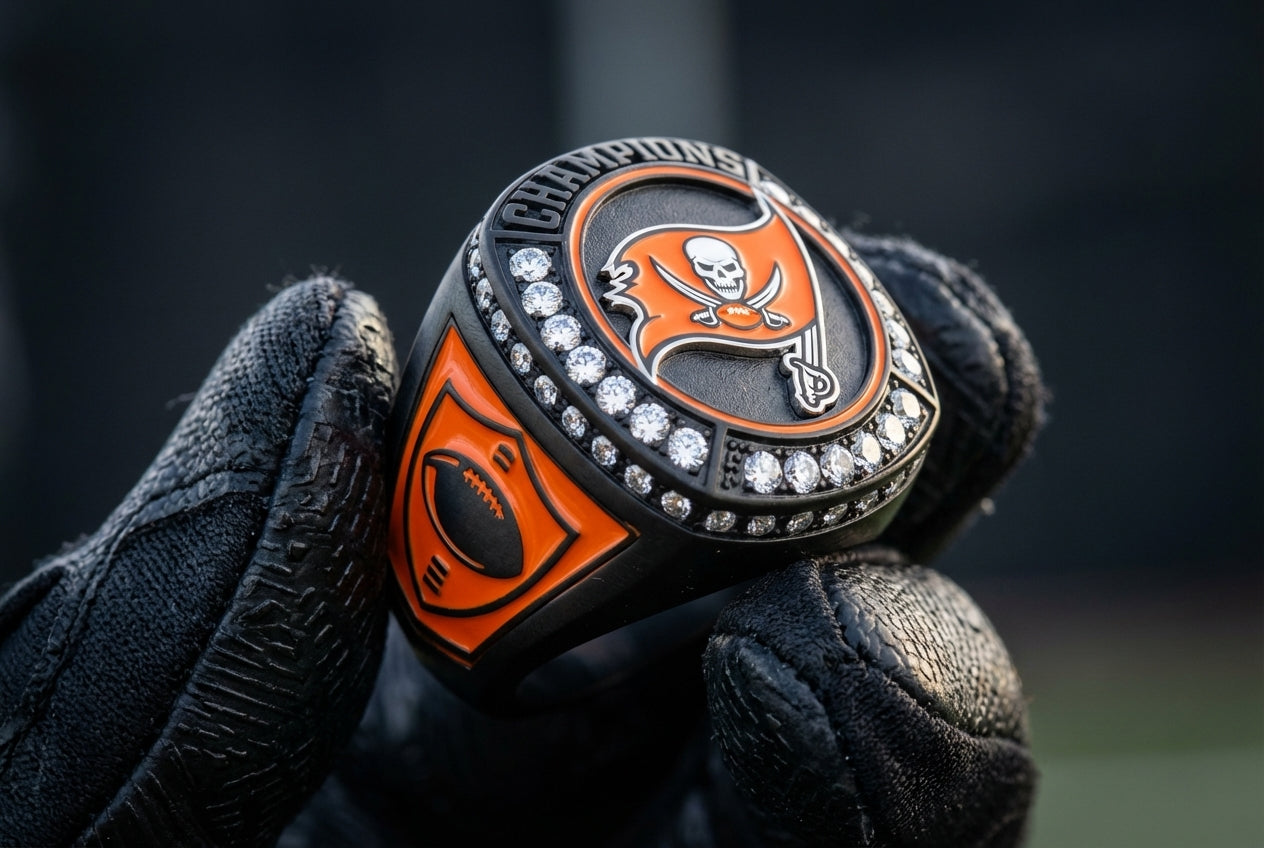 Orange and black custom football championship ring with team logo