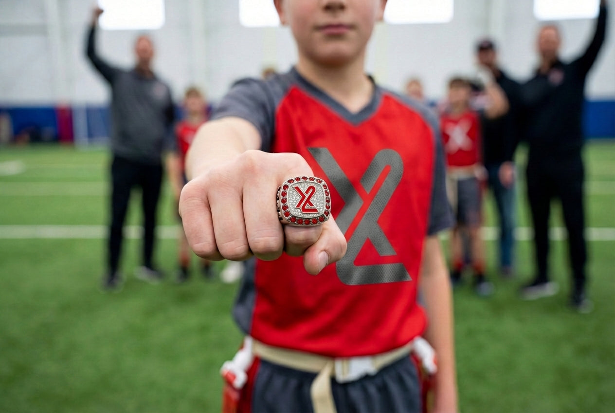 Youth sports team celebrating with custom championship rings